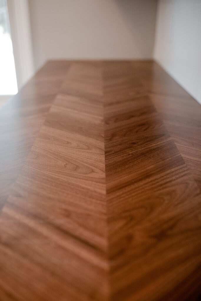 Michigan Valley Homes - Caughlin Home - hallway decorative wood flooring