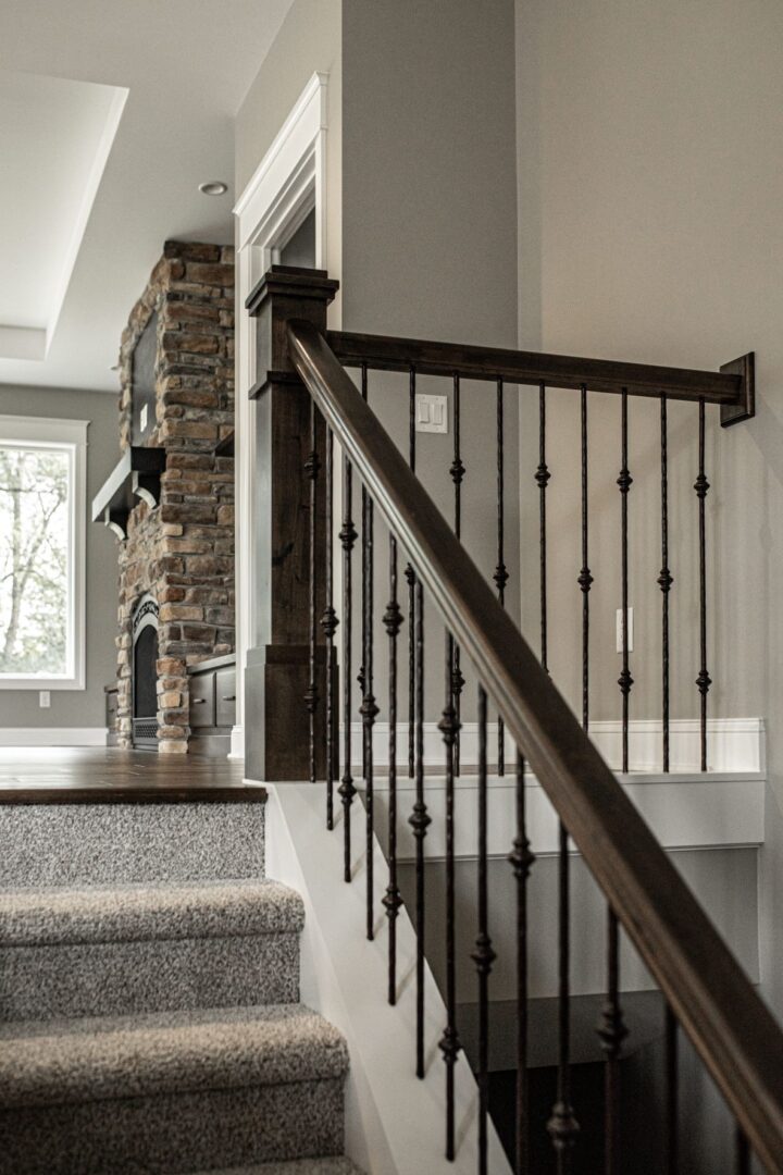 Michigan Valley Homes - The Windemere in Jackson - fireplace and handrail